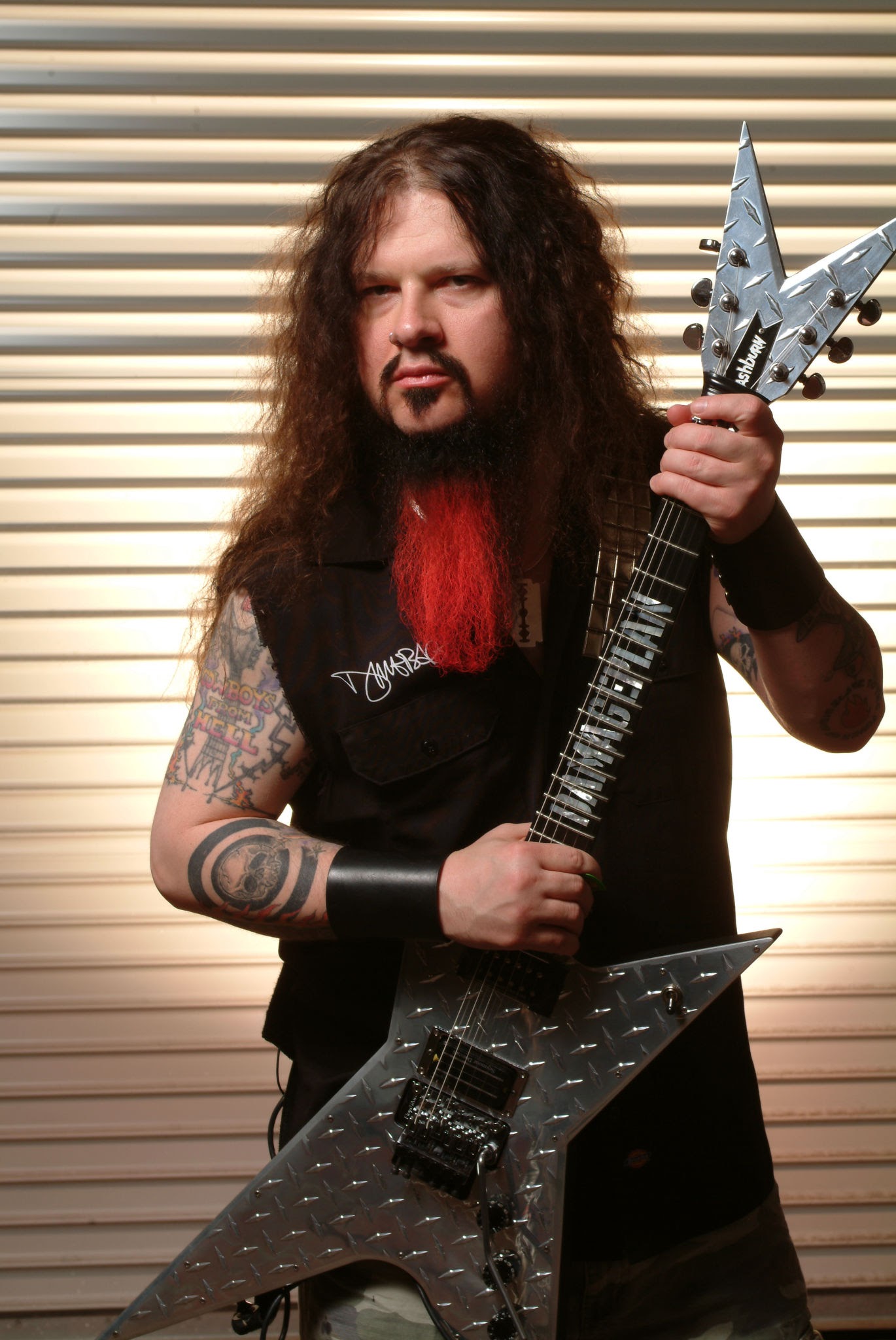(MANDATORY CREDIT William Hames/Shinko Music/Getty Images) Studio portrait of Dimebag Darrell (1966-2004), guitarist with Damageplan and former guitarist of Pantera, holidng a Washburn guitar, at SOMA in San Diego, California on 2nd May 2004. (Photo by William Hames/Shinko Music/Getty Images)